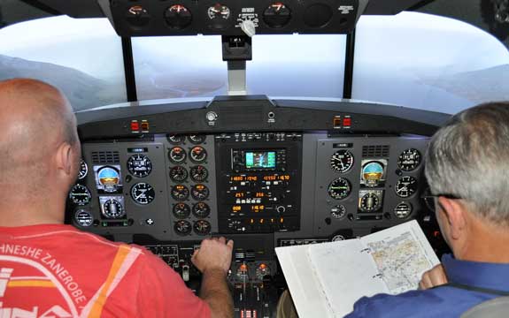 Student Pilot and Instructor in simulator